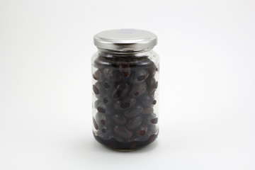 Canned olives in a glass jar