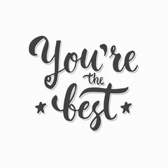 You are the Best - hand drawn lettering phrase, isolated on the gray crosses background. Fun brush ink text inscription for photo overlays, typography greeting card or print, flyer, poster design.