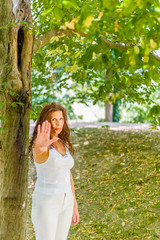 Stop and talk to my hand gesture by over 40 woman