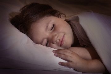 Adorable sleeping little girl, close up