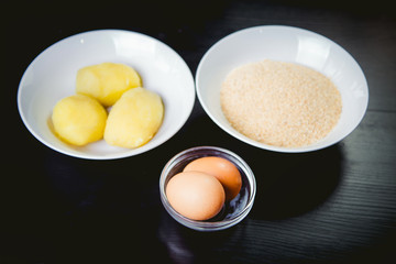 Ingredients cooked meals, boiled potatoes and eggs