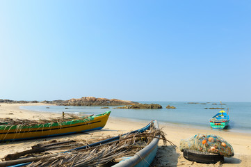 Old fisherman boats at beautiful tropical beach. India