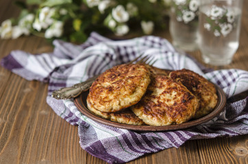Chicken cutlets with porridge cheese and zucchini   