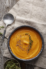 pumpkin creme soup in a dark crockery