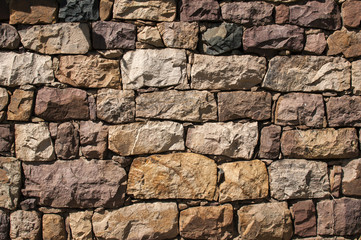 Masonry house stone wall closeup as background