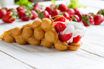 waffles with strawberries and whipped cream