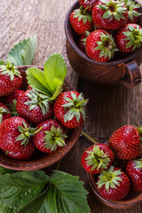 Fresh strawberries on a wooden table