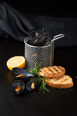 Fresh cooked mussels with Lemon and salt