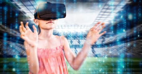 Composite image of little girl holding virtual glasses