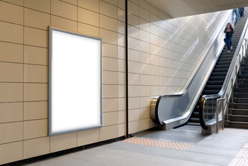 Vertical light box poster mockup in metro station, high resolution. 