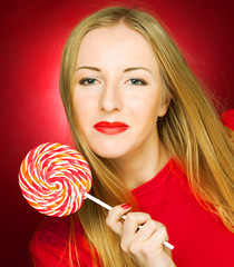  woman holding lollypop
