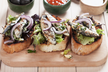 Italian crostini sandwich with sardine fish