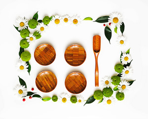 Wooden dishes with wreath frame.