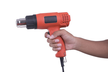 Hand hold hot air blower on white background