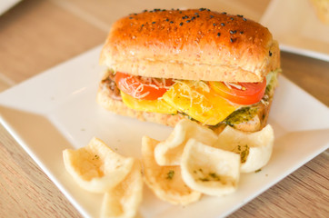 Meat sandwich with cheese and tomato photo image