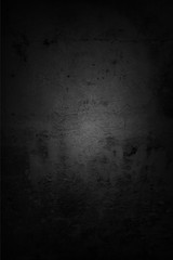 Dark black vertical concrete wall
