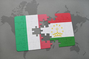 puzzle with the national flag of italy and tajikistan on a world map background.