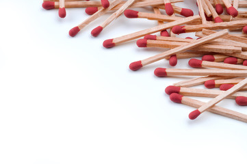 Close-up of red matches on white background