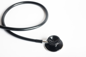 Black stethoscope on white background