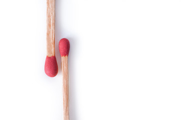 Close-up of red matches on white background