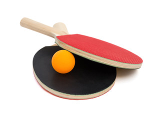 two pingpong rackets and a ball on white with clipping path