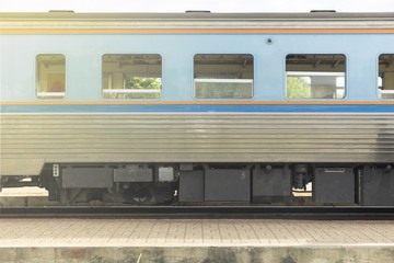 Gradient effect on blue old train parks at the station in Thaila