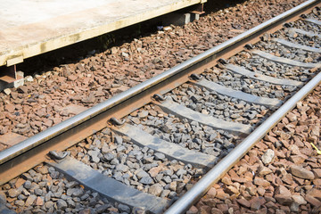 Naklejka premium old railroad tracks at railway station