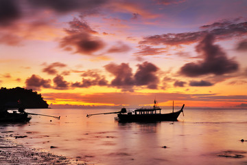 Fisherman  boat in sunrise
