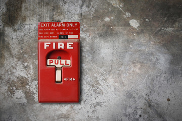 fire alarm switch on the grunge wall