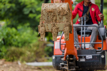 Excavators are digging small.