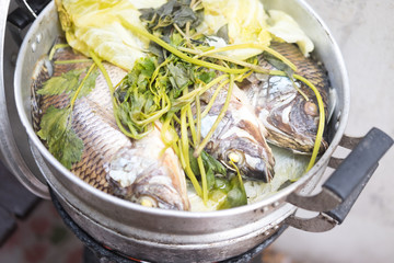 Thai food steamed Tilapia with vegetable