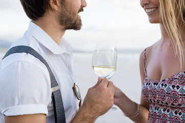 Couple drinking at beach