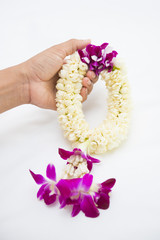 beautiful flower garland in hand