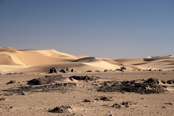 Fototapeta na wymiar Sand and stones desert Oman