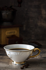 Coffee cup and coffee grinder

