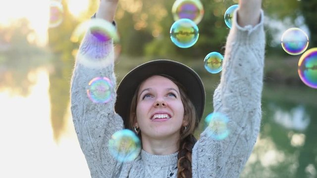Woman catching soap suds