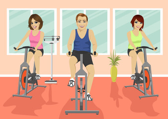 Group of people in gym, exercising their legs doing cardio training