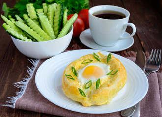 Khachapuri in Adjara (flat cakes with different fillings in the form of a boat) - the national dish of Georgian cuisine. And  a cup of tea