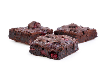 Delicious vegetarian brownie with cherries isolated on white bac