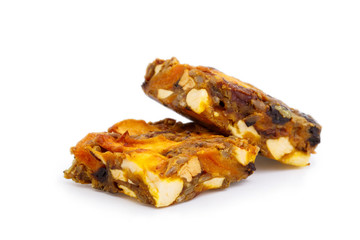 Tasty vegetarian granola crumble cake with dried fruits isolated