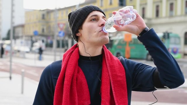 Drinking water and listening to music