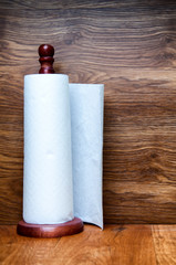 Kitchen paper towel on wooden holder