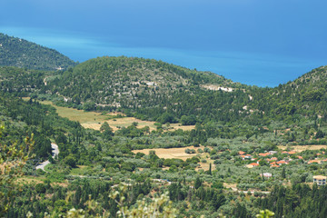 Fototapeta na wymiar Village of Kalamitsi, Lefkada, Greece. Panoramic view on Kalamitsi village and Lefkada coast on a beautiful sunny day 