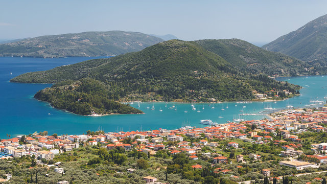 Nidri Town and Geni Bay. Panoramic view of Vlychos bay and Nydri town  Lefkada, Greece. View over town of Nidri 