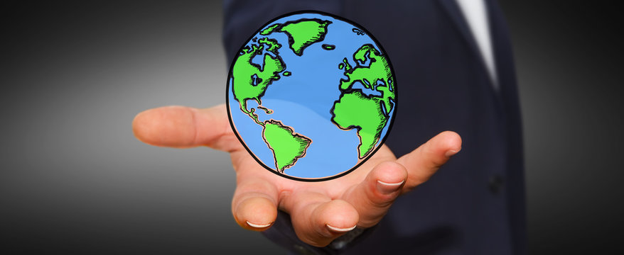 Businessman holding hand drawn planet earth