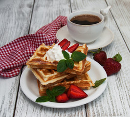belgian waffles with strawberries and mint