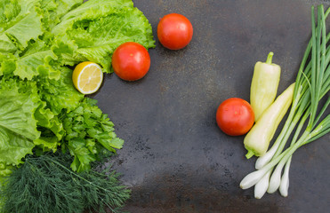 lettuce with dill, parsley, lemon, red tomatoes and green onions