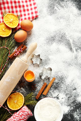 Christmas tree branch with dried oranges, cinnamon, eggs, flour