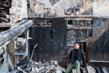 A young man in the ruins