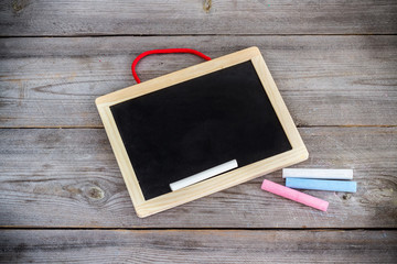 School chalkboard and wooden table